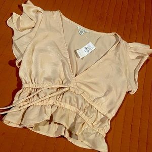 Cream satin ruffle top